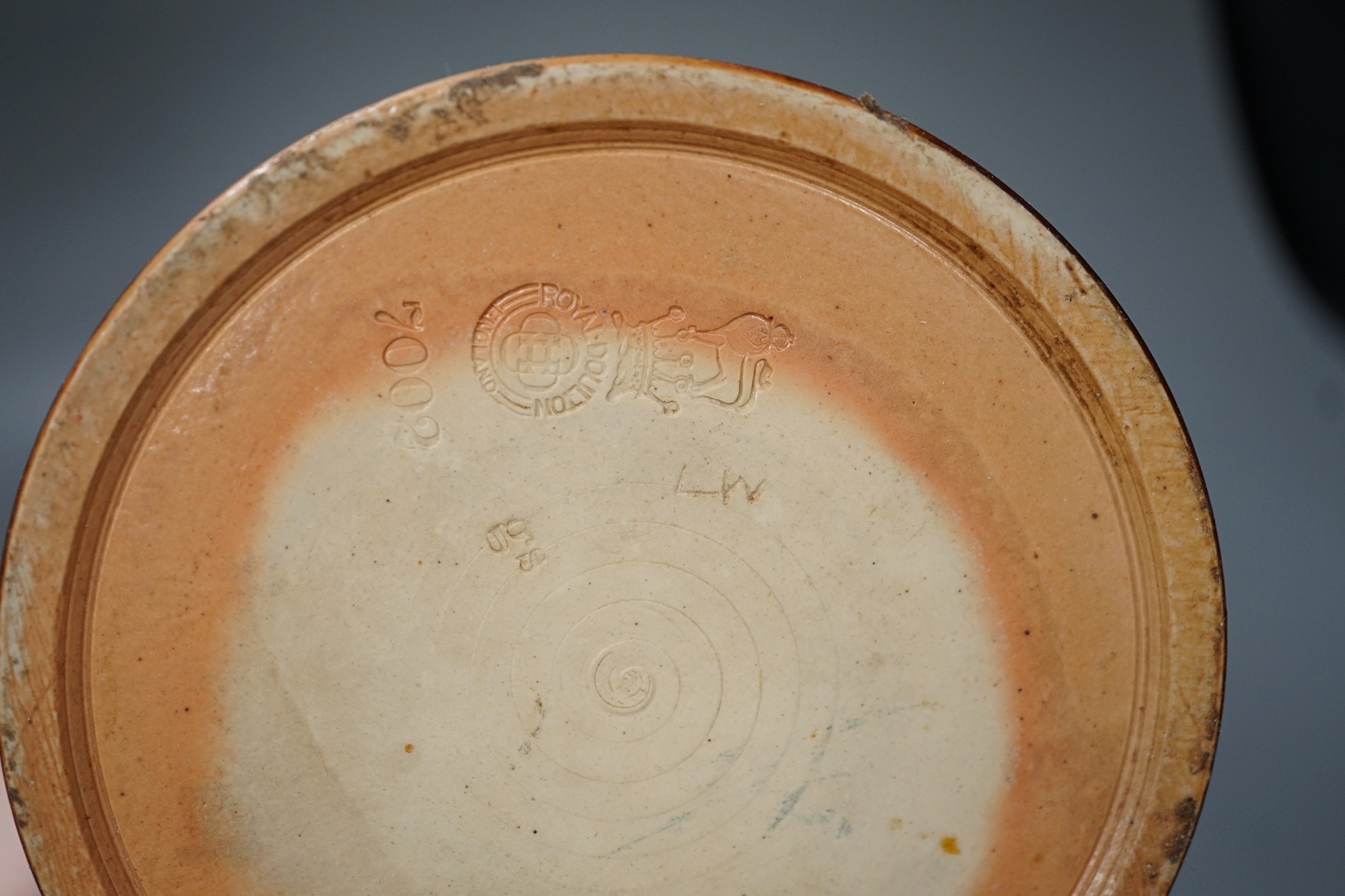 A Royal Doulton stoneware ‘UNC. BORIC.’ drug jar 18cm and a Doulton Slater’s patent flagon, 33cm